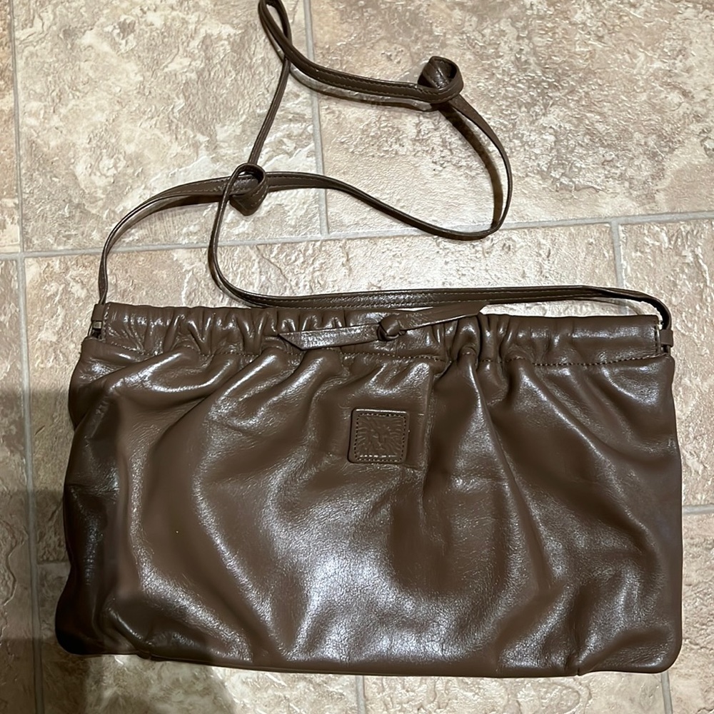 Anne Klein dark taupe clutch …. Hinged
